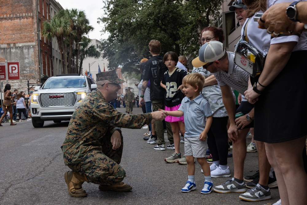 Marine Forces Reserve Band leads the Super Bowl LIX Parade