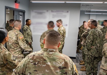 Admiral Alvin Holsey visits illegal aliens holding operations center at Naval Station Guantanamo Bay