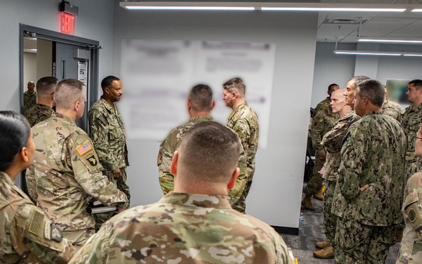 Admiral Alvin Holsey visits illegal aliens holding operations center at Naval Station Guantanamo Bay