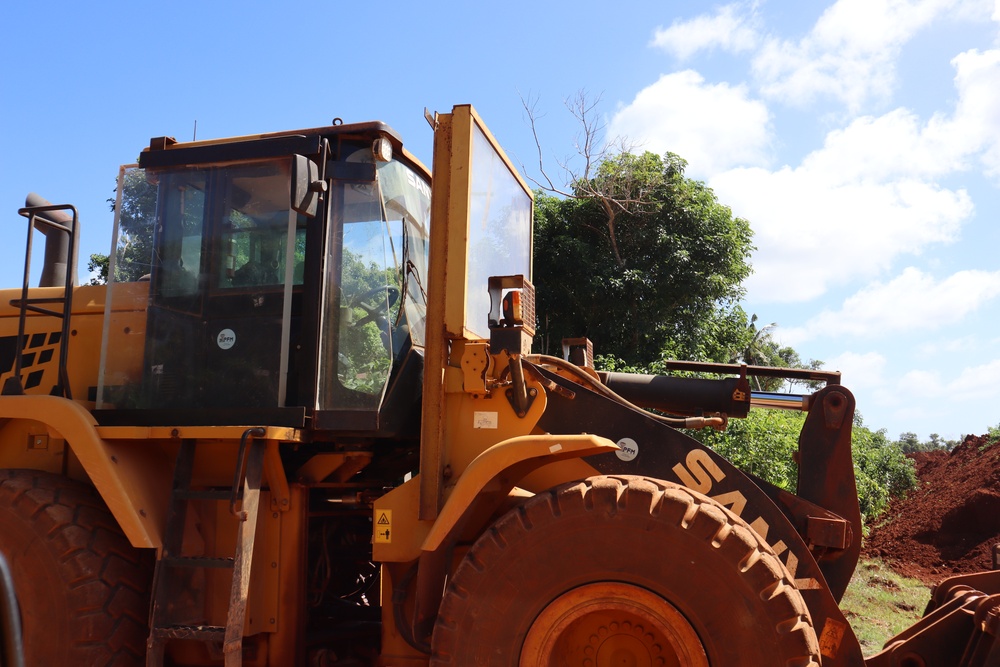 A Bulldozer is Fitted with a Three-Inch Plexiglass Shield to Protect the Operator During UXO Operations