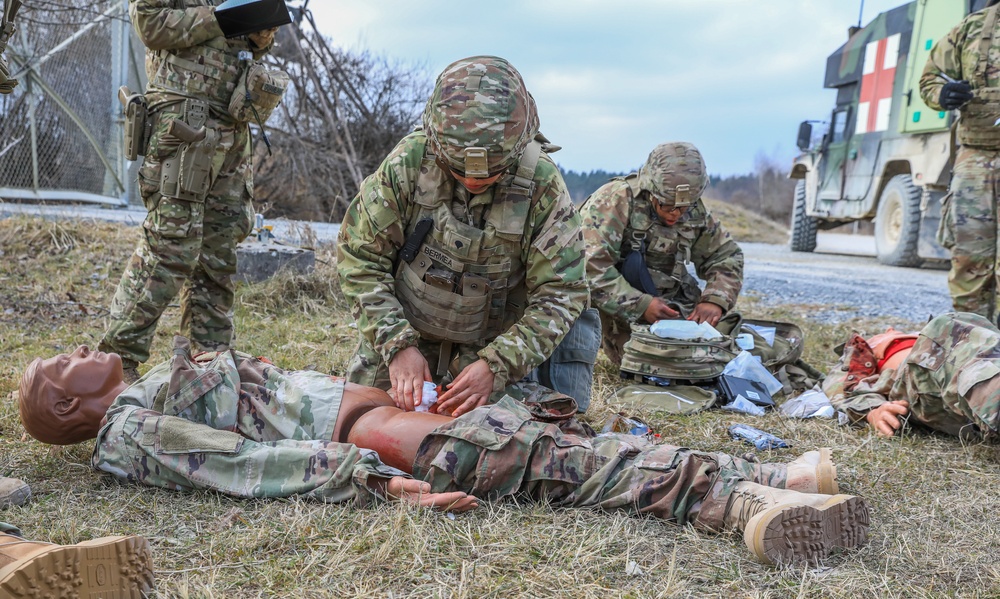 Soldiers from 41st FAB conduct medical assessments on simulated casualties during brigade evaluation exercise