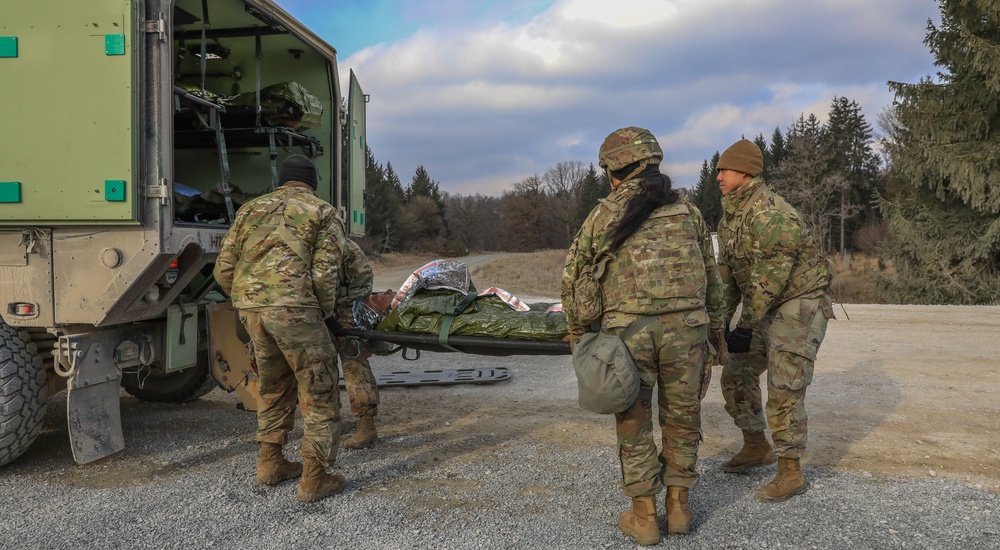 Soldiers from 41st FAB conduct medical assessments on simulated casualties during brigade evaluation exercise