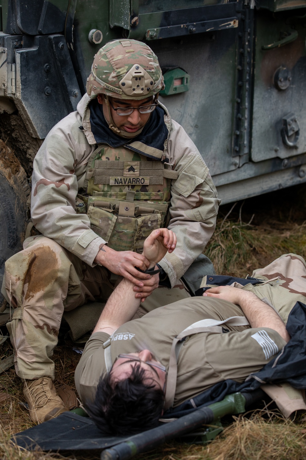 U.S. Soldiers assigned to 41st FAB conduct a mass casualty simulation during brigade EXEVALs