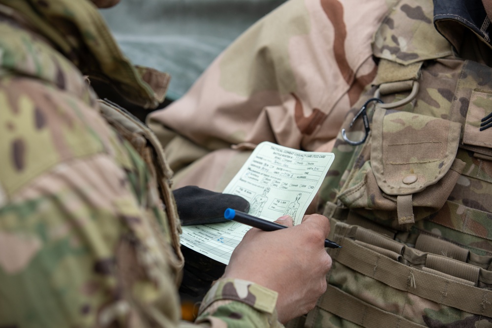 U.S. Soldiers assigned to 41st FAB conduct a mass casualty simulation during brigade EXEVALs