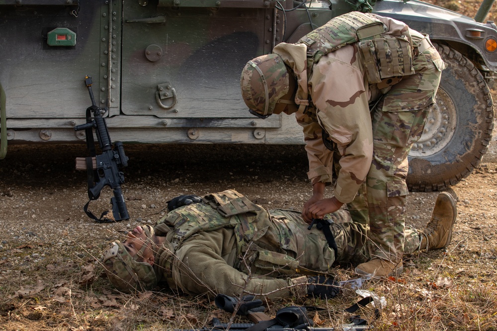 U.S. Soldiers assigned to 41st FAB conduct a mass casualty simulation during brigade EXEVALs