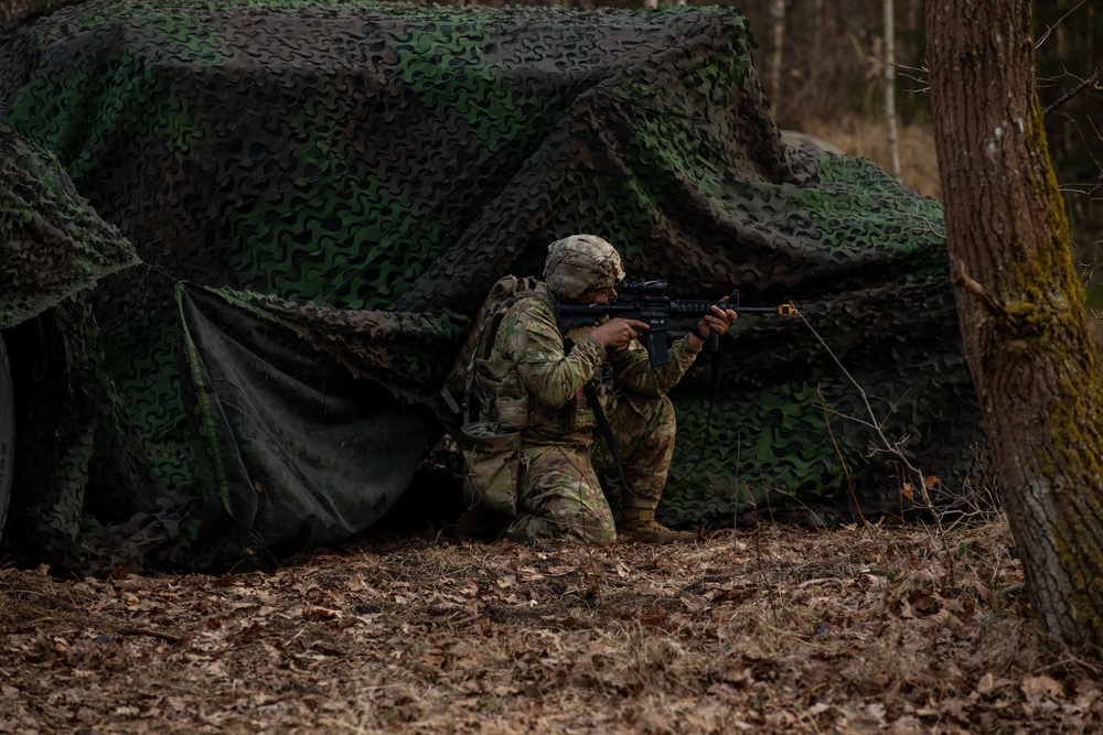 U.S. Soldiers assigned to 41st FAB conduct a mass casualty simulation during brigade EXEVALs