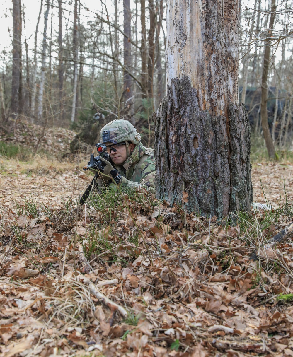 Soldiers from the 41st Field Artillery Brigade execute a surprise attack during Brigade live-fire exercise