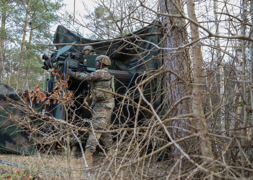 Soldiers from the 41st Field Artillery Brigade execute a surprise attack during Brigade live-fire exercise