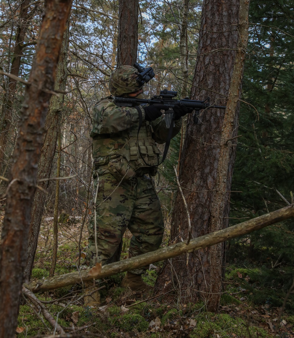 Soldiers from the 41st Field Artillery Brigade execute a surprise attack during Brigade live-fire exercise