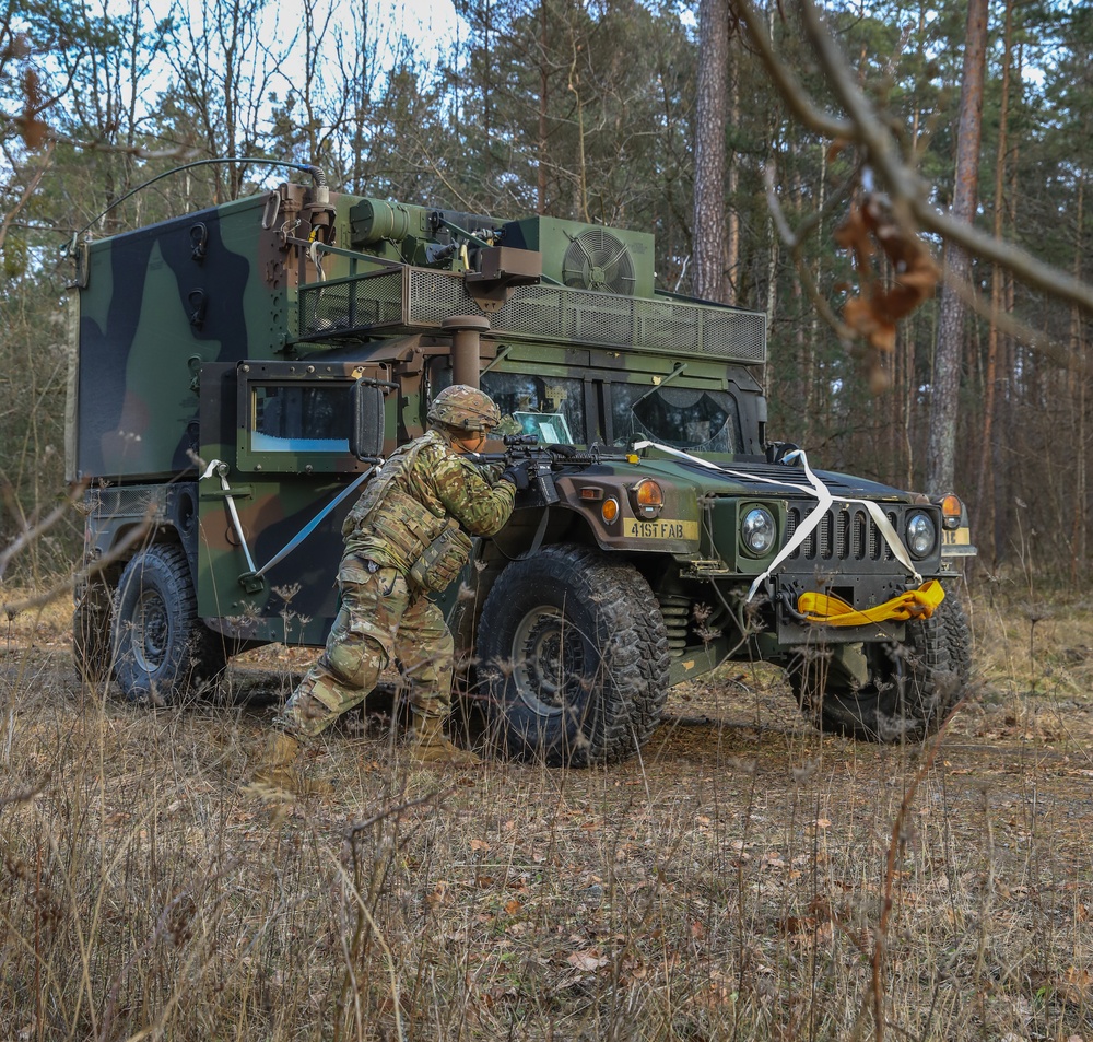 Soldiers from the 41st Field Artillery Brigade execute a surprise attack during Brigade live-fire exercise