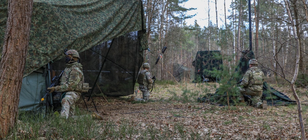 Soldiers from the 41st Field Artillery Brigade execute a surprise attack during Brigade live-fire exercise