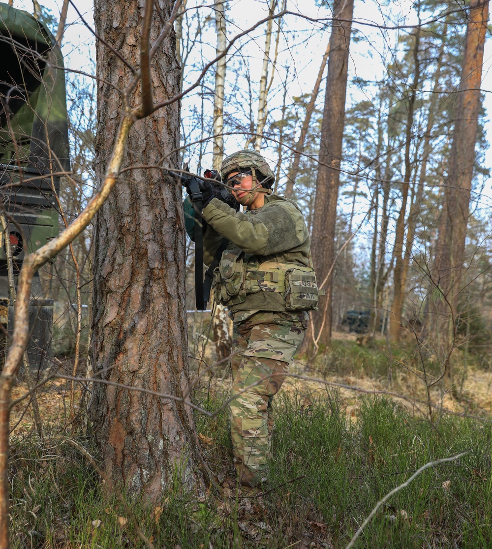 Soldiers from the 41st Field Artillery Brigade execute a surprise attack during Brigade live-fire exercise