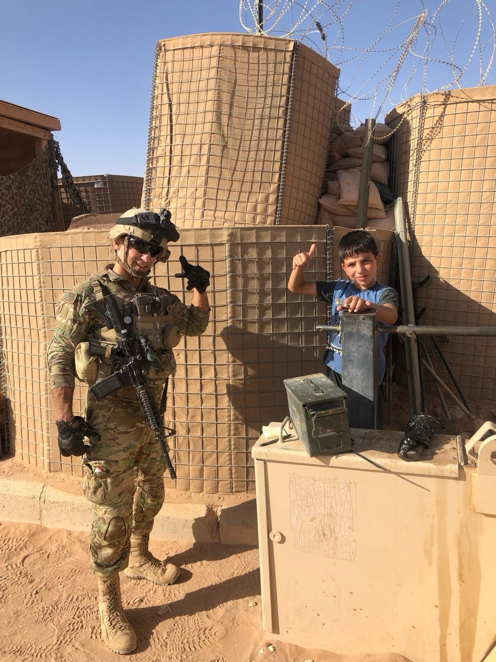 Staff Sgt. Riggleman &amp; local Syrian Circa 2019