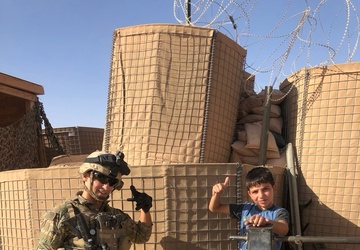 Staff Sgt. Riggleman &amp; local Syrian Circa 2019