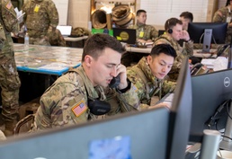 Computer-based simulation trains 42nd Inf. Div. headquarters under realistic war conditions