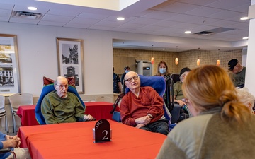 Airmen from the 109th Airlift Wing attend a lunch with veterans