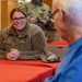 Airmen from the 109th Airlift Wing attend a lunch with veterans