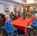 Airmen from the 109th Airlift Wing attend a lunch with veterans