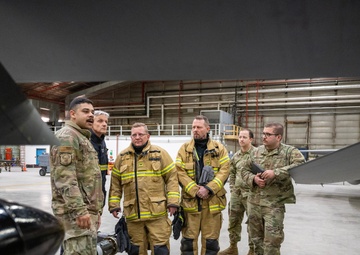 Danish Firefighters tour F-16 for Operation NOBLE DEFENDER