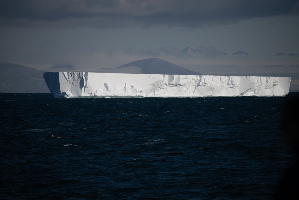 USCGC Polar Star (WAGB 10) conducts crane operations in McMurdo Sound during Operation Deep Freeze