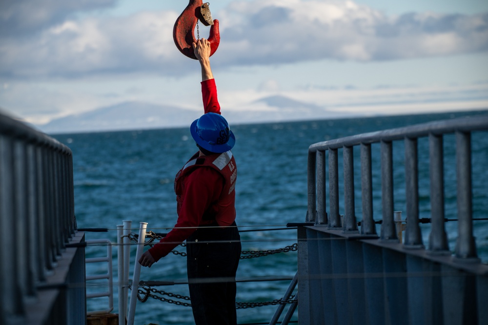USCGC Polar Star (WAGB 10) conducts crane operations in McMurdo Sound during Operation Deep Freeze