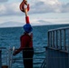 USCGC Polar Star (WAGB 10) conducts crane operations in McMurdo Sound during Operation Deep Freeze