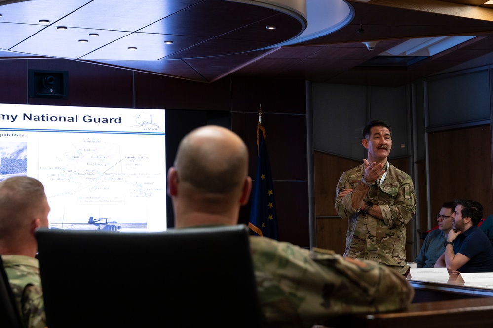 Col. Komatsu Presents to Monoglian Ministry of Defense