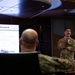 Col. Komatsu Presents to Monoglian Ministry of Defense