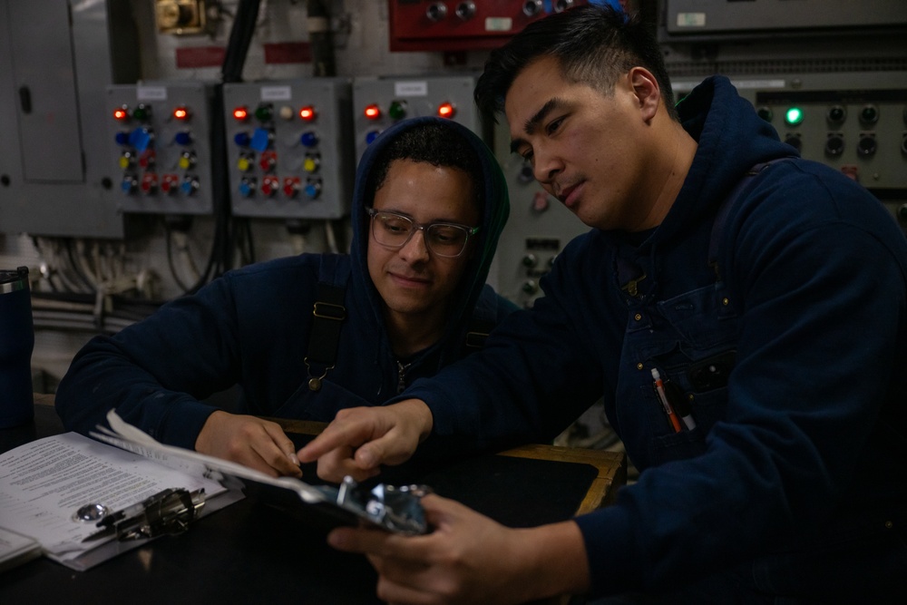 USCGC Polar Star (WAGB 10) crewmembers conduct damage control training in McMurdo Sound during Operation Deep Freeze