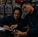 USCGC Polar Star (WAGB 10) crewmembers conduct damage control training in McMurdo Sound during Operation Deep Freeze