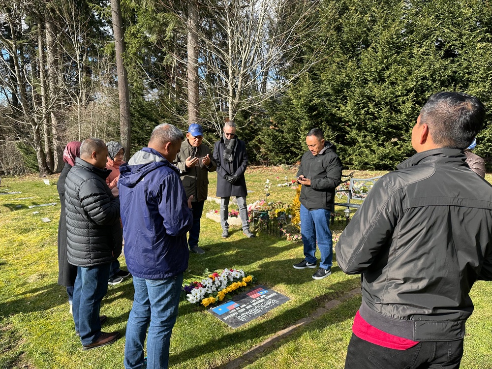 Royal Malaysian Air Force members honor fallen comrade