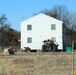 Contractors prepare second World War II-era barracks to be moved at Fort McCoy