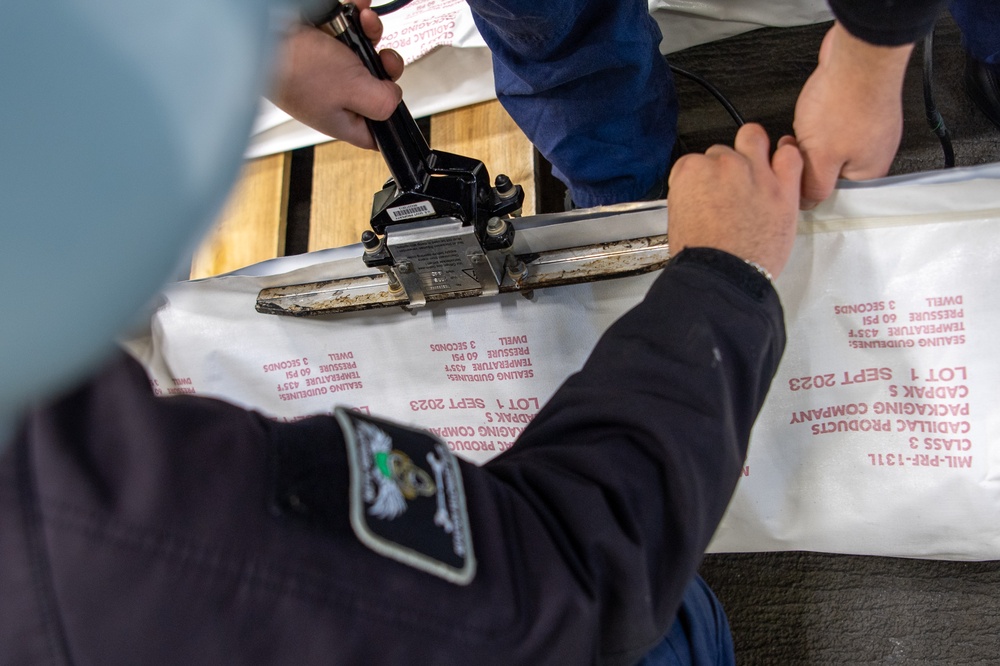 USS Ronald Reagan (CVN 76) Sailors conduct preservation