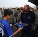 Legends and Heroes Unite: National Football League Hall of Famers and Cheerleaders join forces with Marines at MCBH