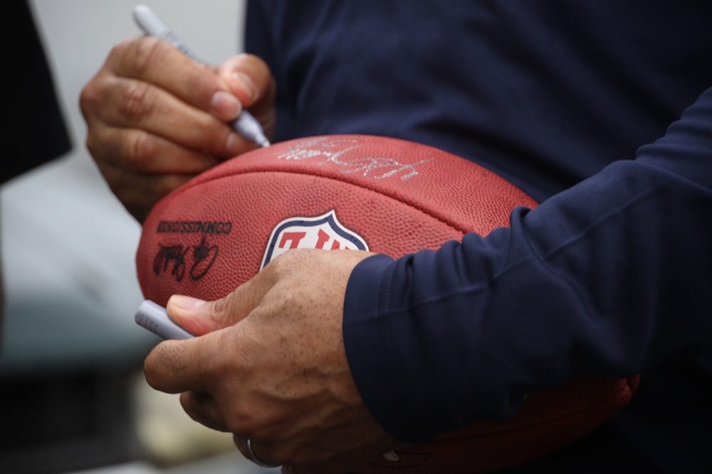 Legends and Heroes Unite: National Football League Hall of Famers and Cheerleaders join forces with Marines at MCBH