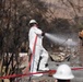 U.S. Army Corps of Engineers clears debris from a house in Altadena