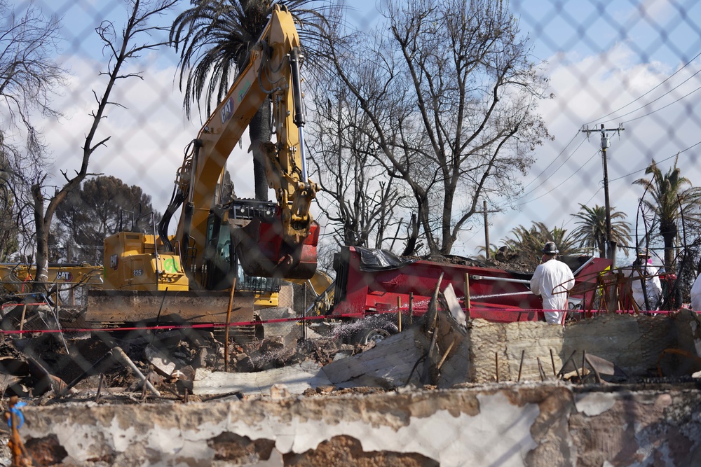 U.S. Army Corps of Engineers clears debris from a house in Altadena