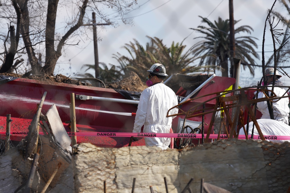 U.S. Army Corps of Engineers clears debris from a house in Altadena