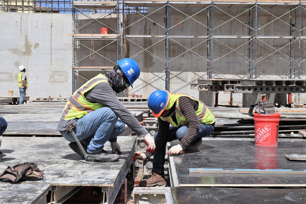 H-2B Visa Workers Make Progress on a Building Under Construction on Marine Corps Base Camp Blaz