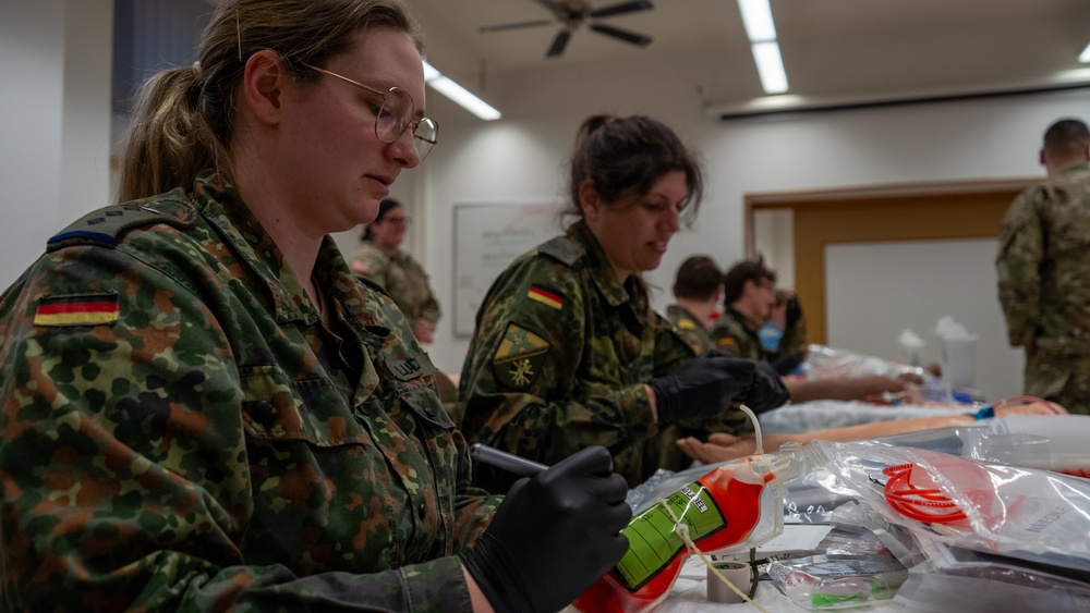 U.S. and German Soldiers conduct whole blood transfusion training in Germany