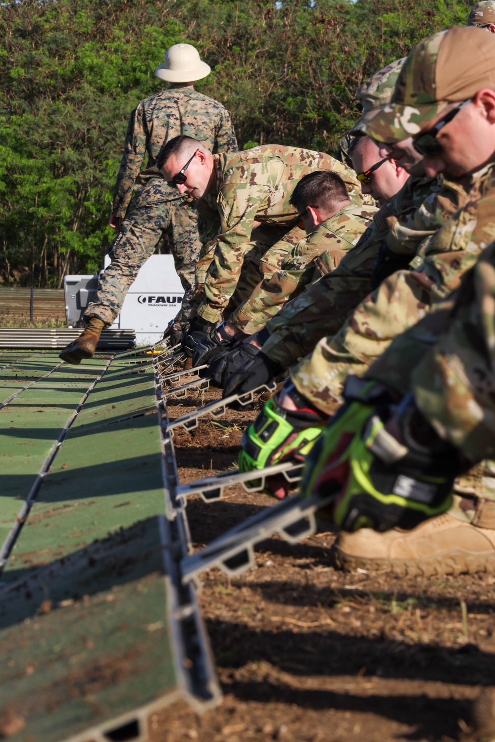 U.S. Marines and U.S. Air Force National Guard setup a FARP during a joint field exercise