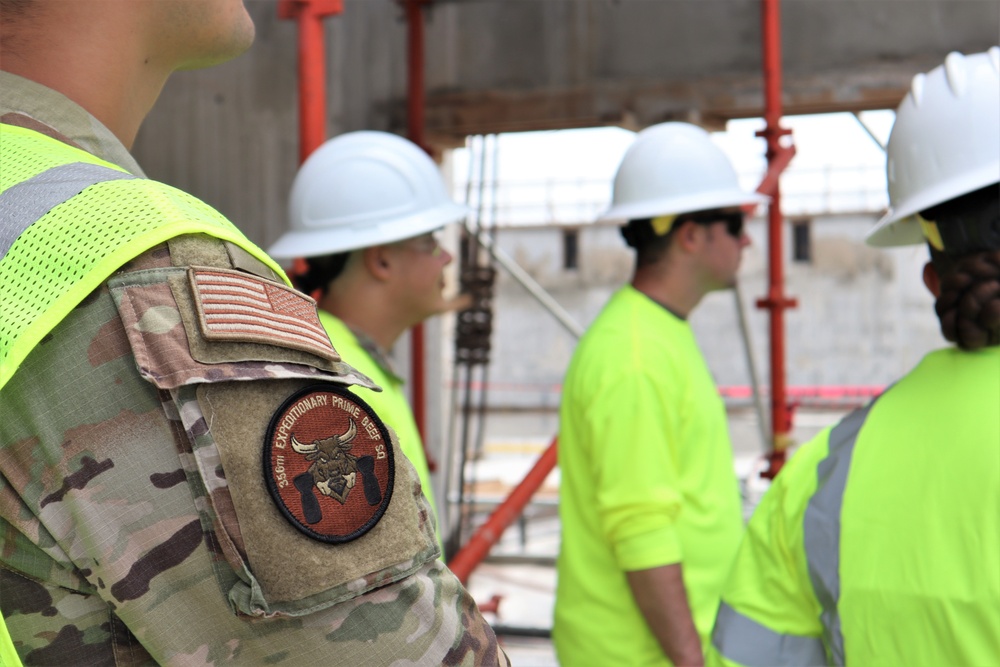 Airmen Tour a NAVFAC Construction Project While Forward Deployed