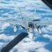 U.S. Air Force KC-135 refuels two U.S. Marine F/A-18s