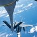 U.S. Air Force KC-135 refuels two U.S. Marine F/A-18s