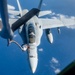 U.S. Air Force KC-135 refuels two U.S. Marine F/A-18s