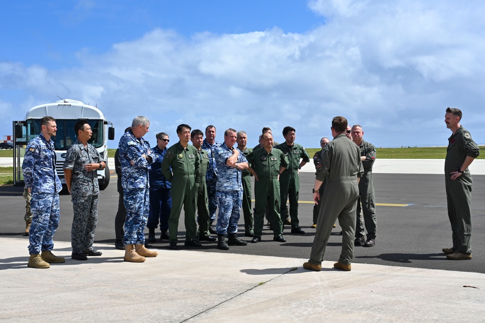 Distinguished visitors from Cope North 2025 visit 34th EBS B-1B Lancer during immersion tour