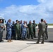 Distinguished visitors from Cope North 2025 visit 34th EBS B-1B Lancer during immersion tour