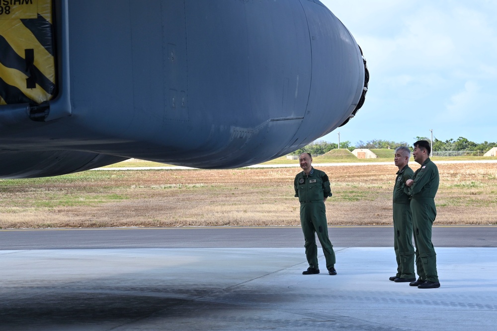 Distinguished visitors from Cope North 2025 visit 34th EBS B-1B Lancer during immersion tour