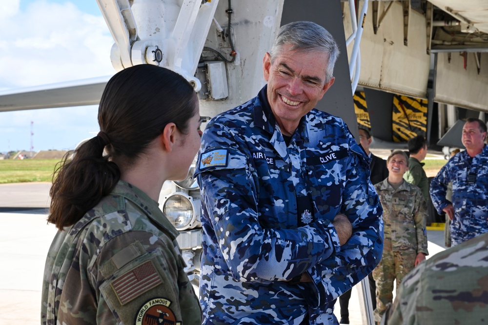 Distinguished visitors from Cope North 2025 visit 34th EBS B-1B Lancer during immersion tour