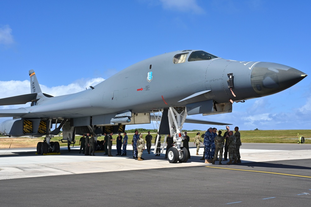 Distinguished visitors from Cope North 2025 visit 34th EBS B-1B Lancer during immersion tour